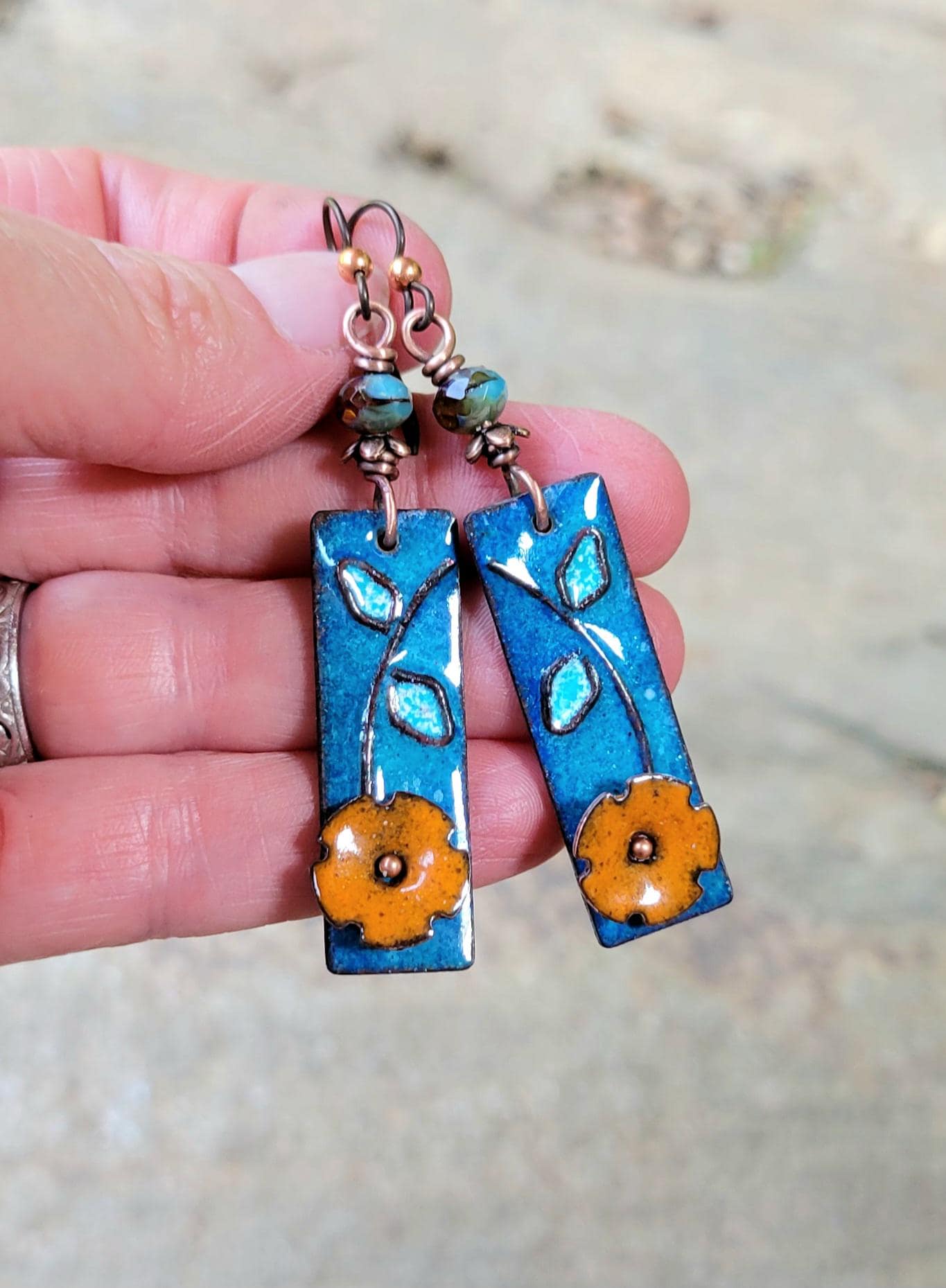 Boho Orange Flower Torch Enamel Earrings - handmade, light blue petals against a deep blue, copper, glass, lightweight, beautiful gift