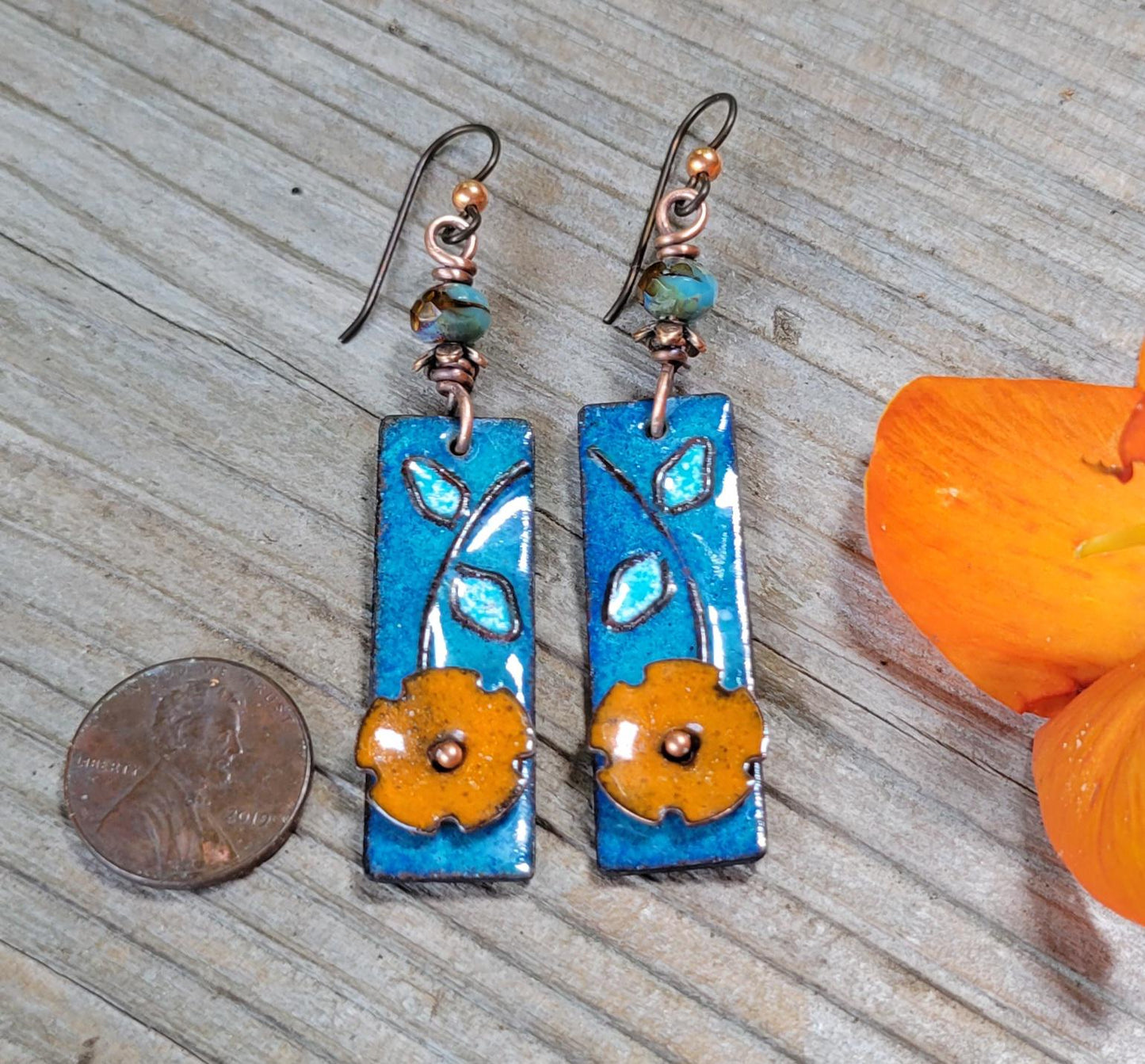 Boho Orange Flower Torch Enamel Earrings - handmade, light blue petals against a deep blue, copper, glass, lightweight, beautiful gift